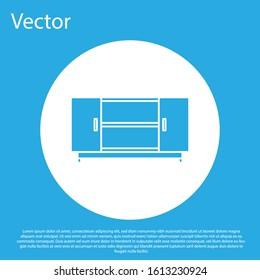 Blue TV table stand icon isolated on blue background. White circle button. Vector Illustration