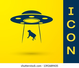 Blue UFO abducts cow icon isolated on yellow background. Flying saucer. Alien space ship. Futuristic unknown flying object. Vector Illustration