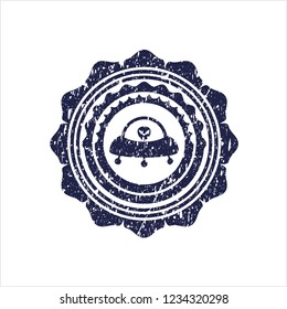 Blue ufo with aline inside icon inside distressed rubber stamp