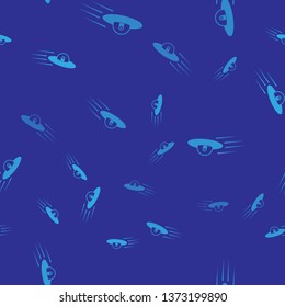 Blue UFO flying spaceship and alien icon isolated seamless pattern on blue background. Flying saucer. Alien space ship. Futuristic unknown flying object. Vector Illustration