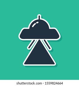Blue UFO flying spaceship icon isolated on green background. Flying saucer. Alien space ship. Futuristic unknown flying object.  Vector Illustration