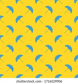 Blue umbrella on yellow background, seamless pattern background, summer background concept, vector.
