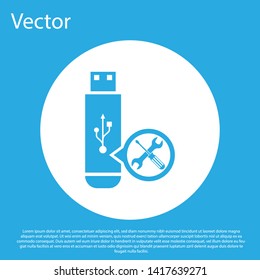 Blue USB flash drive with screwdriver and wrench icon isolated on blue background. Adjusting, service, setting, maintenance, repair, fixing. White circle button. Vector Illustration