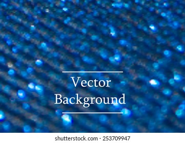 Blue vector background with sparkles and bokeh.