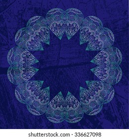 Blue vector mandala on blue textured background