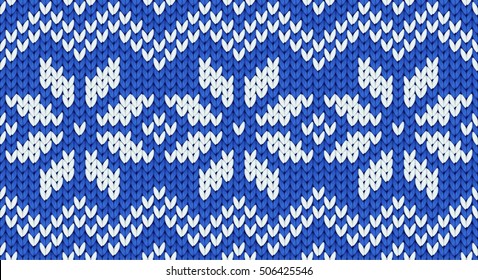 Blue vector realistic knit seamless pattern with white snowflakes and zig zag ornament