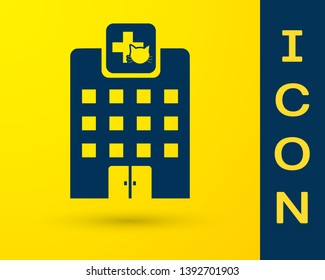 Blue Veterinary medicine hospital, clinic or pet shop for animals icon isolated on yellow background. Vet or veterinarian clinic. Vector Illustration