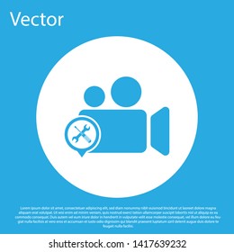 Blue Video camera with screwdriver and wrench icon isolated on blue background. Adjusting, service, setting, maintenance, repair, fixing. White circle button. Vector Illustration