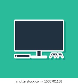 Blue Video game console icon isolated on green background. Game console with joystick and lcd television.  Vector Illustration