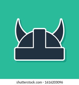 Blue Viking in horned helmet icon isolated on green background.  Vector Illustration