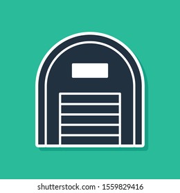Blue Warehouse icon isolated on green background.  Vector Illustration