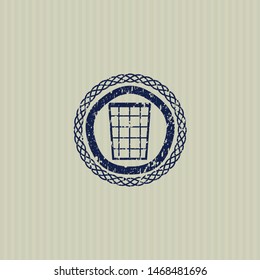 Blue wastepaper basket icon inside distressed rubber texture