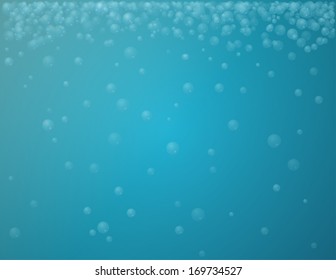 blue water background with air bubbles rising up
