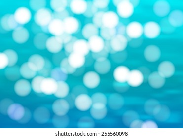 Blue water background with bokeh. sunshine ocean vector illustration. Sea waves with hotspots summer bright wallpaper.