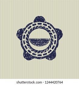Blue watermelon icon inside rubber seal