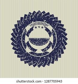 Blue watermelon icon inside rubber stamp with grunge texture