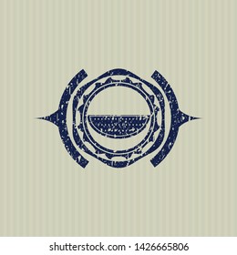 Blue watermelon icon inside rubber stamp with grunge texture