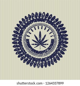 Blue weed leaf icon inside distressed grunge seal