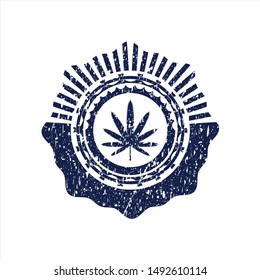 Blue weed leaf icon inside rubber seal