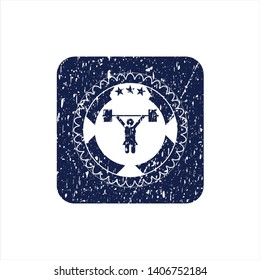 Blue weightlifter girl icon inside distressed rubber grunge stamp