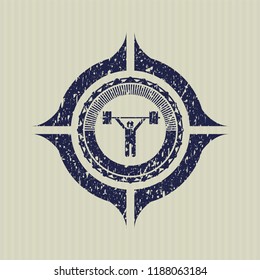 Blue weightlifting icon inside distressed rubber grunge seal