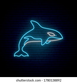 Blue whale neon sign. Glowing whale emblem on dark brick wall background. Vector illustration.