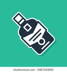 Blue Whiskey bottle icon isolated on green background.  Vector