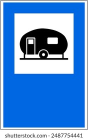 Blue, white and black colored road sign caravan site. Illustration made July 11th, 2024, Zurich, Switzerland.