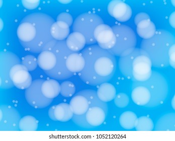 Blue and white bokeh background texture or backdrop.