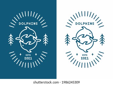 Blue and white color of dolphins badge design