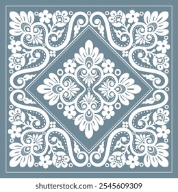 A blue and white floral design with a diamond shape. The design is very intricate and detailed, with many flowers and leaves.