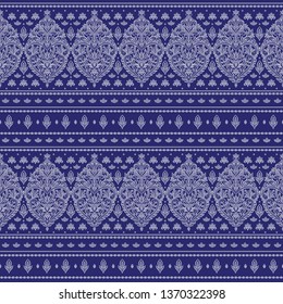Blue and white floral seamless pattern with ornamental stripes. Traditional oriental motifs. Vintage ornament template. Decorative paisley elements. Great for fabric and textile.