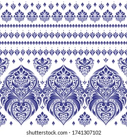 Blue and white floral seamless pattern with ornamental stripes. Traditional oriental motifs. Vintage ornament template. Decorative paisley elements. Great for fabric and textile.