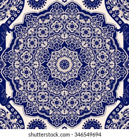 Blue and white floral seamless pattern. Vector indian decorative wallpaper. Colorful pattern with mandala and stylized flowers. Design for wrapping paper, web, cover, fabric, textile, curtains, carpet