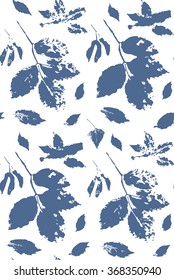 Blue and white floral seamless pattern with leaves of wild grape, ash tree and maple seeds stylized as stamp or imprint; rustic or boho style. May be used for textile or in scrapbooking