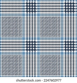 Blue and white glen check pattern. Scottish houndstooth plaid, fabric swatch close-up.