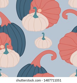 Blue, white and orange pumpkins in a seamless pattern design, perfect to use on the web, or in print, for surface design
