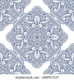 Blue and white ornamental seamless pattern. Vintage, paisley elements. Ornament. Traditional, Ethnic, Turkish, Indian motifs. Great for fabric and textile, wallpaper, packaging or any desired idea