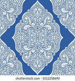 Blue and white ornamental seamless pattern. Vintage, paisley elements. Ornament. Traditional, Ethnic, Turkish, Indian motifs. Great for fabric and textile, wallpaper, packaging or any desired idea