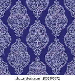 Blue and white ornamental seamless pattern. Vintage, paisley elements. Ornament. Traditional, Ethnic, Turkish, Indian motifs. Great for fabric and textile, wallpaper, packaging or any desired idea