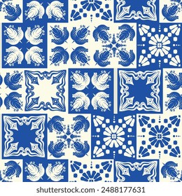 The blue and white seamless pattern displays symmetrical geometric designs. Ceramic tile abstract background