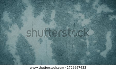 a blue and white tie dye fabric texture closeup
