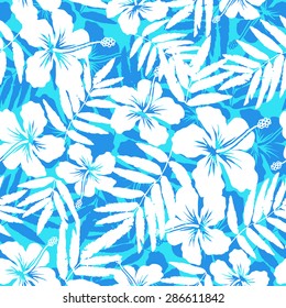 Blue and white tropical flowers silhouettes vector seamless pattern