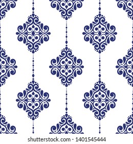 Blue and white vintage seamless pattern with ornamental stripes. Traditional oriental motifs. Ornament template. Decorative paisley elements. Great for fabric and textile.