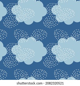 Blue and white Winter Doodle Abstract seamless Pattern with cloud and snowflake. Trendy hand drawn textures Winter-time Background. Snowy Abstractive design for paper, fabric, interior decor, wrapping