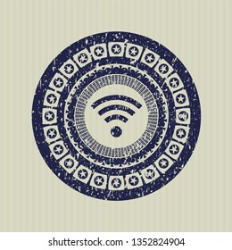 Blue wifi signal icon inside distressed rubber seal