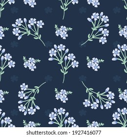 Blue wildflowers on a dark background.Pattern for textile, fabric, background, wallpaper, packaging paper.