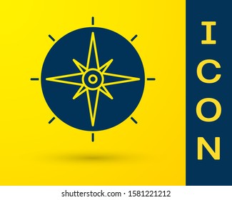 Blue Wind rose icon isolated on yellow background. Compass icon for travel. Navigation design.  Vector Illustration