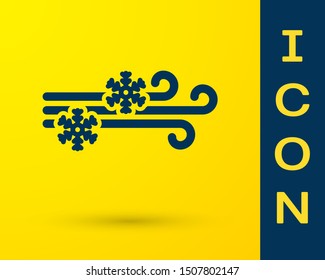 Blue Wind and snow icon isolated on yellow background. Windy weather.  Vector Illustration