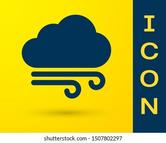 Blue Windy weather icon isolated on yellow background. Cloud and wind.  Vector Illustration